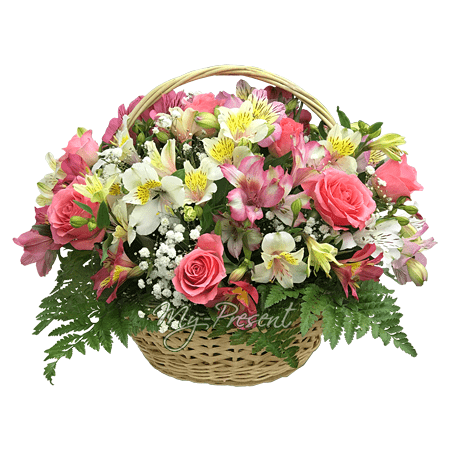 Basket with roses and alstroemerias decorated with verdure