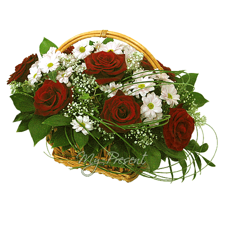 Basket with roses and chrysantemums decorated with verdure